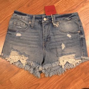 NWT Mossimo Supply Co denim distressed lace high rise shorts. Size 25